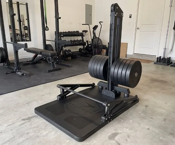 Model One in a home garage gym